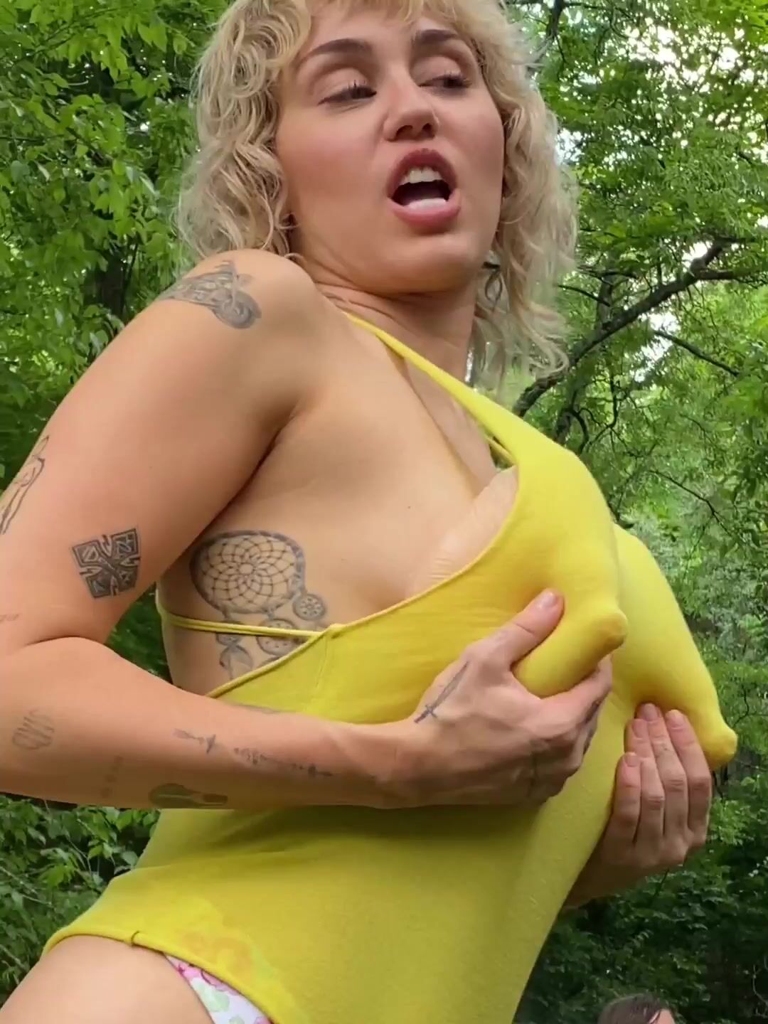 miley cyrus Swimsuit and puffy nipples