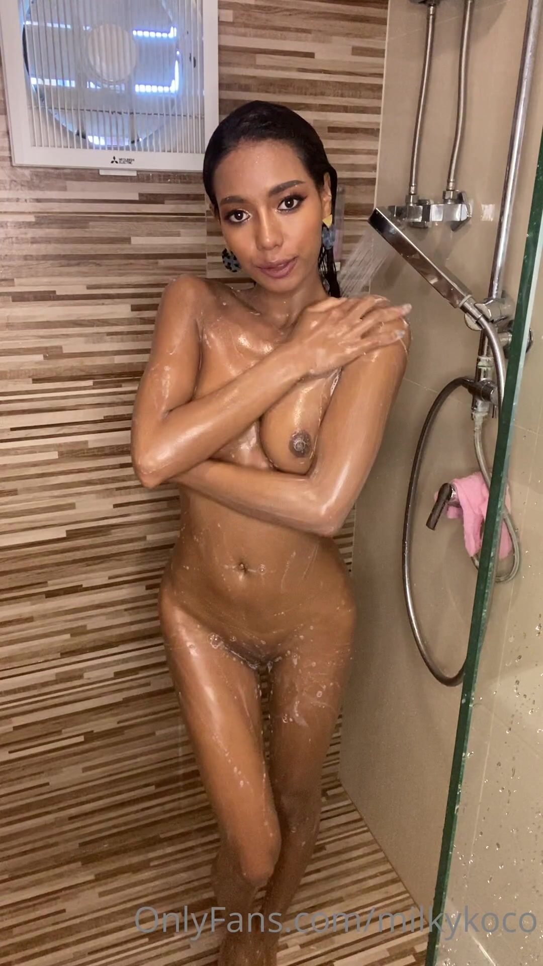 Milky coco taking a shower